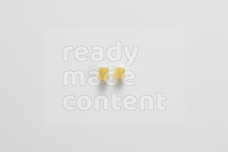 Small rings pasta on white background