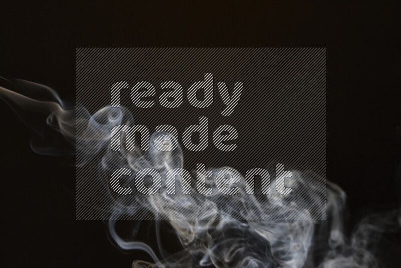 Motion of wavy smoke isolated on dark background