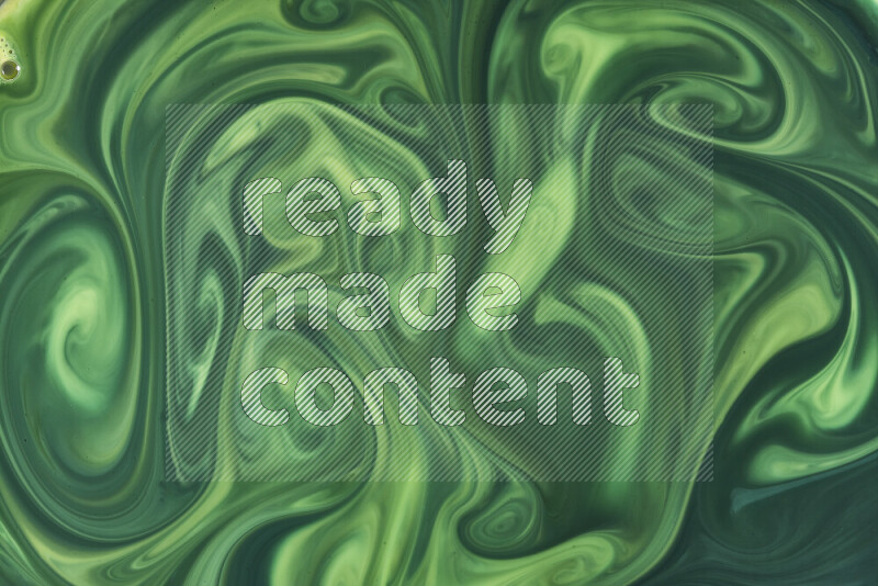 A close-up of abstract swirling patterns in green gradients