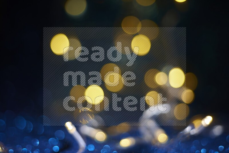 Bokeh light in yellow with blue background