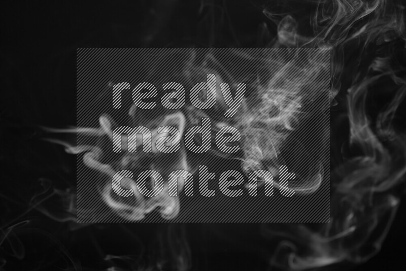 Motion of wavy smoke isolated on dark background