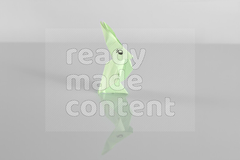 Origami animals on grey background