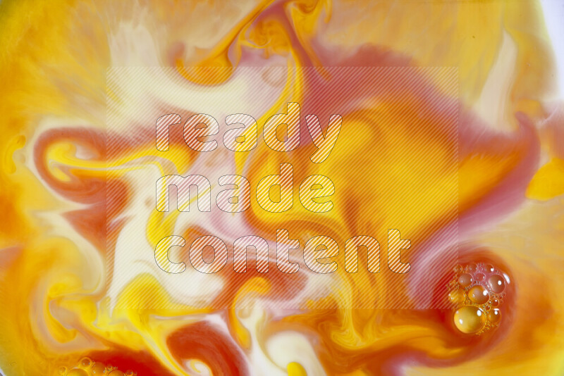 A close-up of abstract swirling patterns in orange, red and white