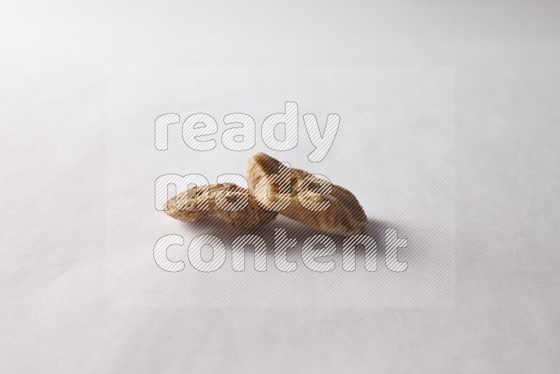 Dried figs on white background