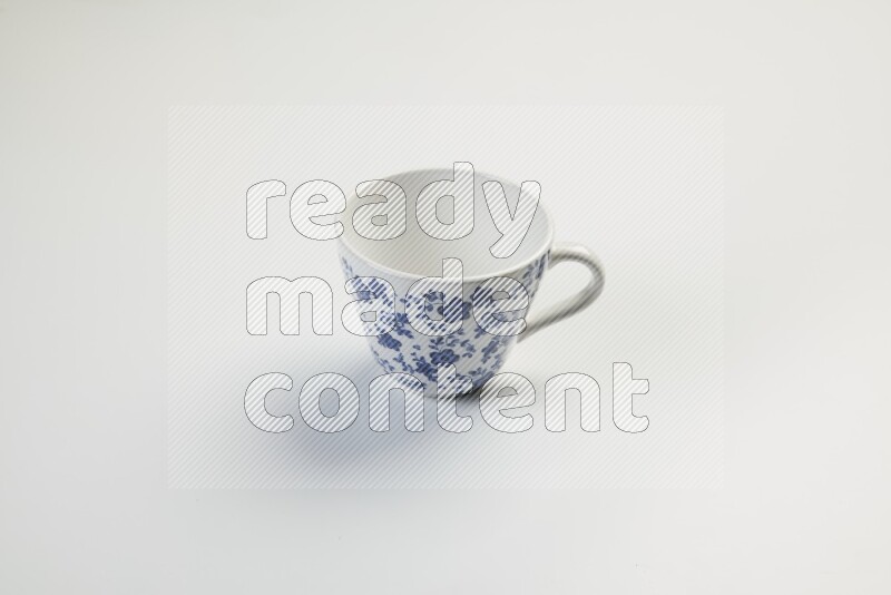 white and blue mug on white background