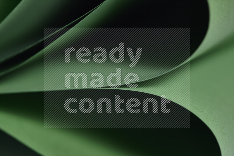 فن تجريدي يعرض المنحنيات المرتبة للأوراق باللون الأخضر