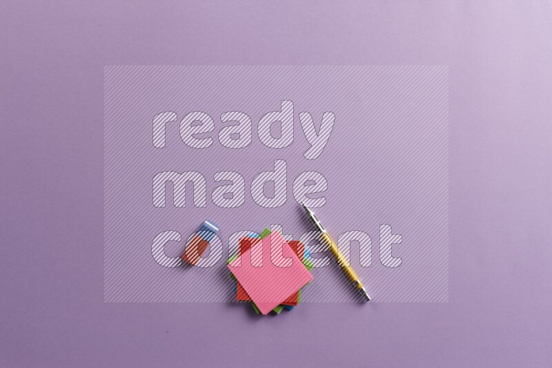 Multicolored sticky notes with school supplies on purple background