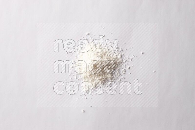 Desiccated coconuts on white background