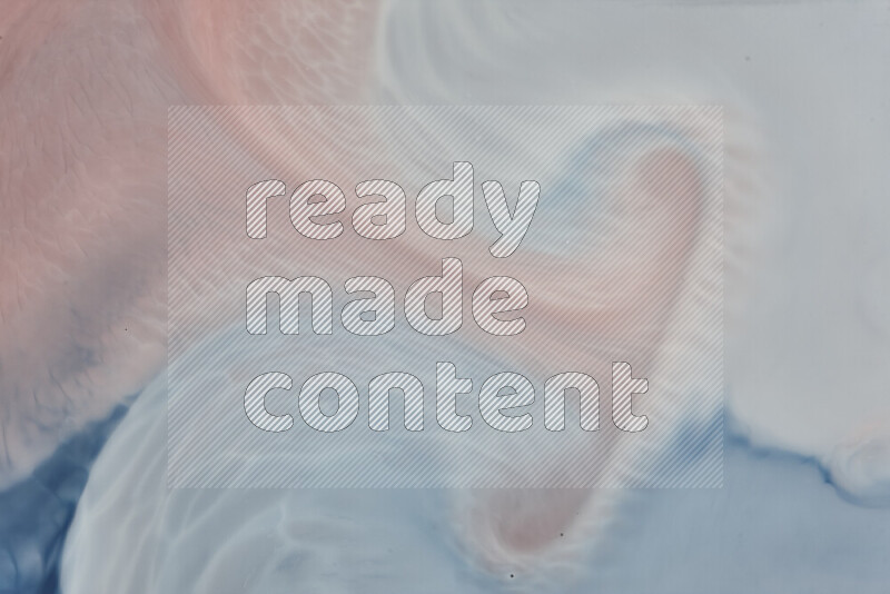 A close-up of abstract swirling patterns in blue, red and white