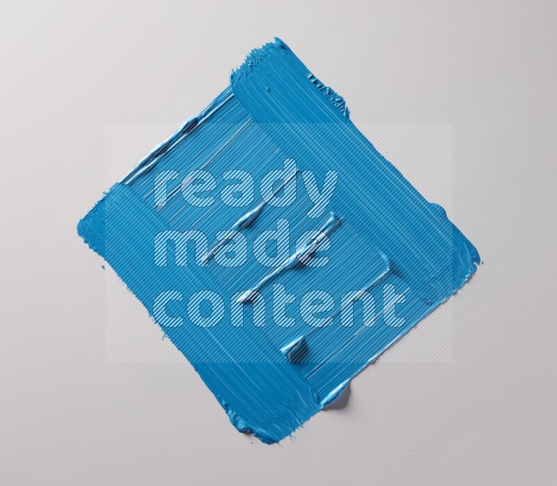 Multi blue straight brush strokes in different shapes on a white background