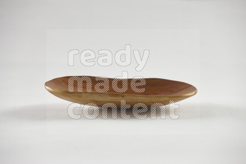 A wooden plate on white background