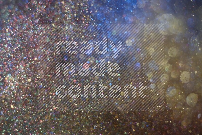 Multicolored glitter powder isolated on black background