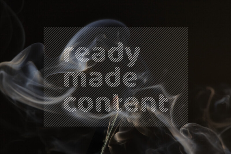 Motion of wavy smoke isolated on dark background