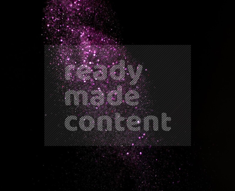 Pink glitter powder isolated on black background