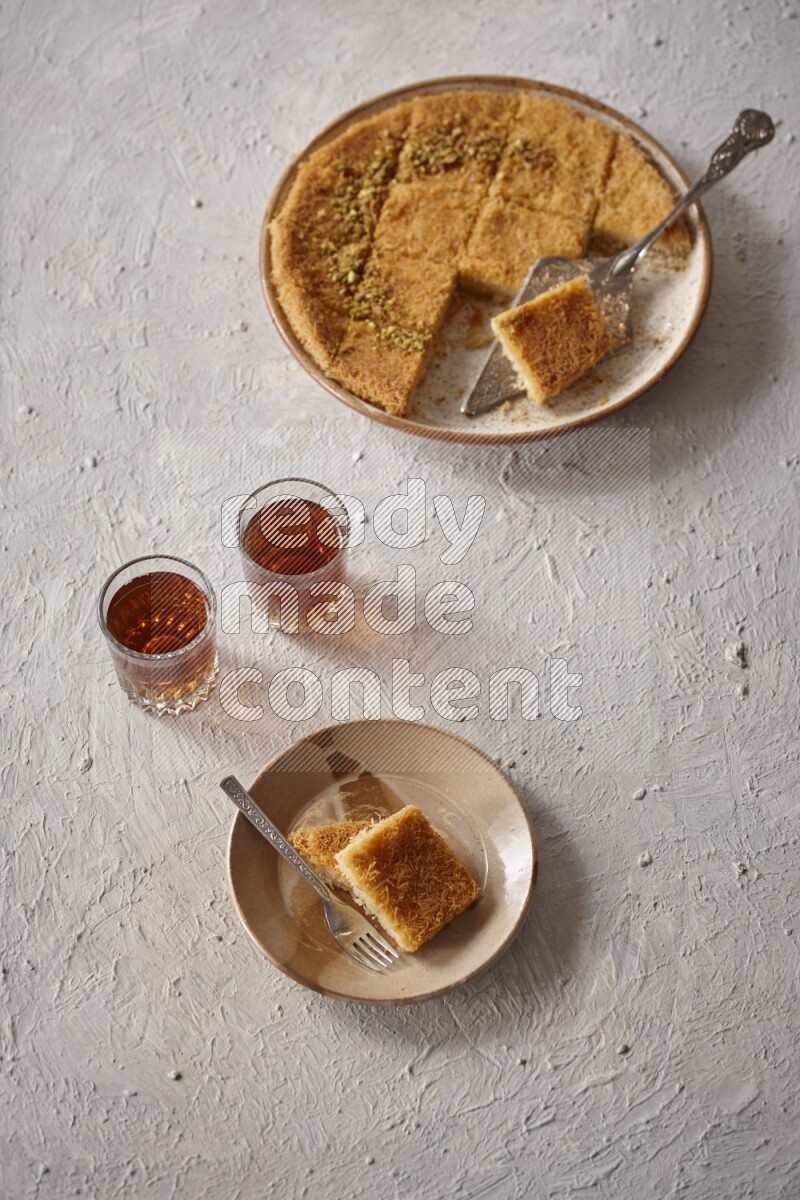 Konafa with tea in a light setup