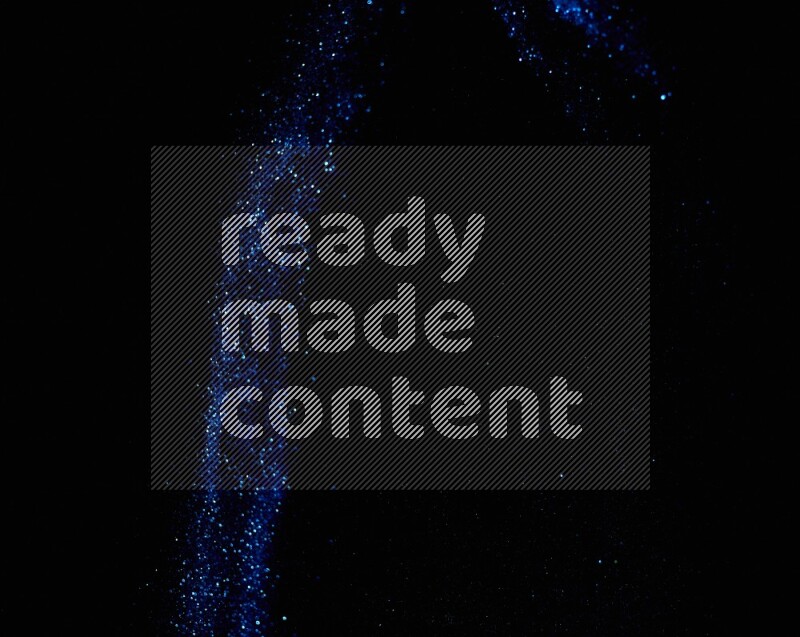 Blue glitter powder isolated on black background