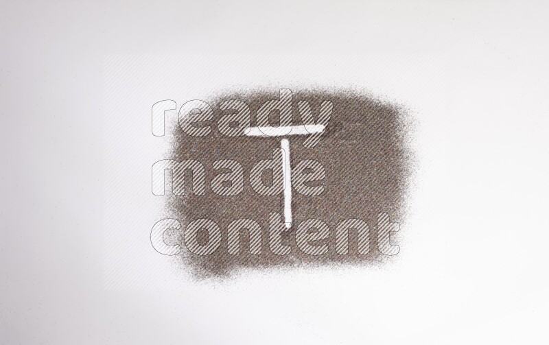 Alphabets written with glitter on white background