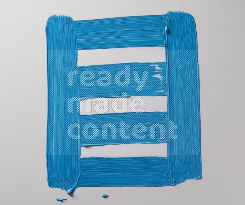 Multi blue straight brush strokes in different shapes on a white background