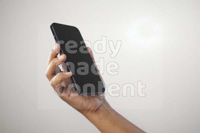 Male hand holding Smart phone on White background