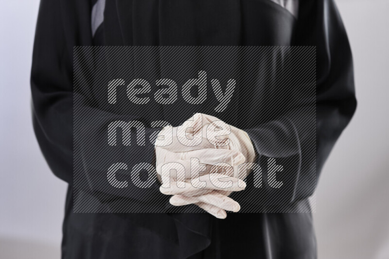 Female doctor wearing an abaya and medical attire in different positions