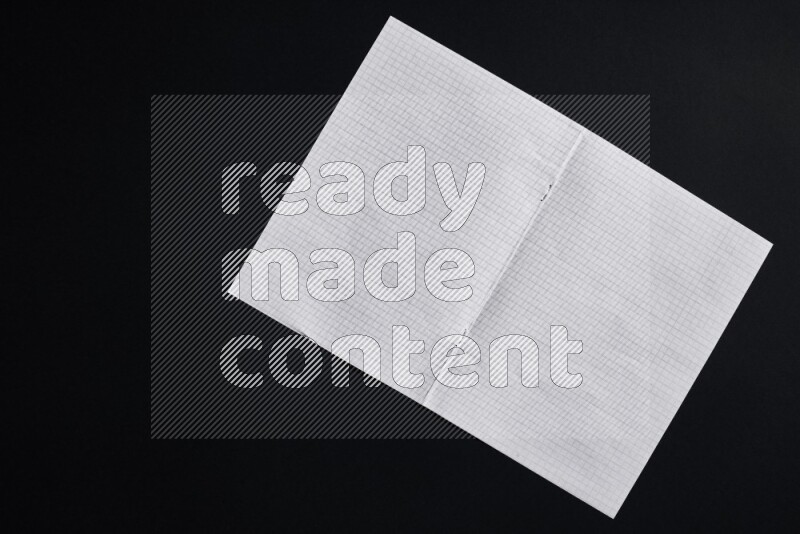 Notebook sheet on black background