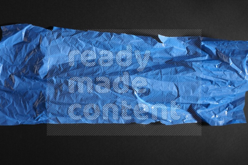 Colored plastic textures on black background