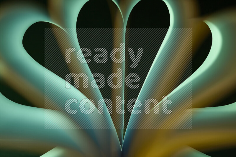 An abstract art piece displaying smooth curves in yellow and green gradients created by colored light