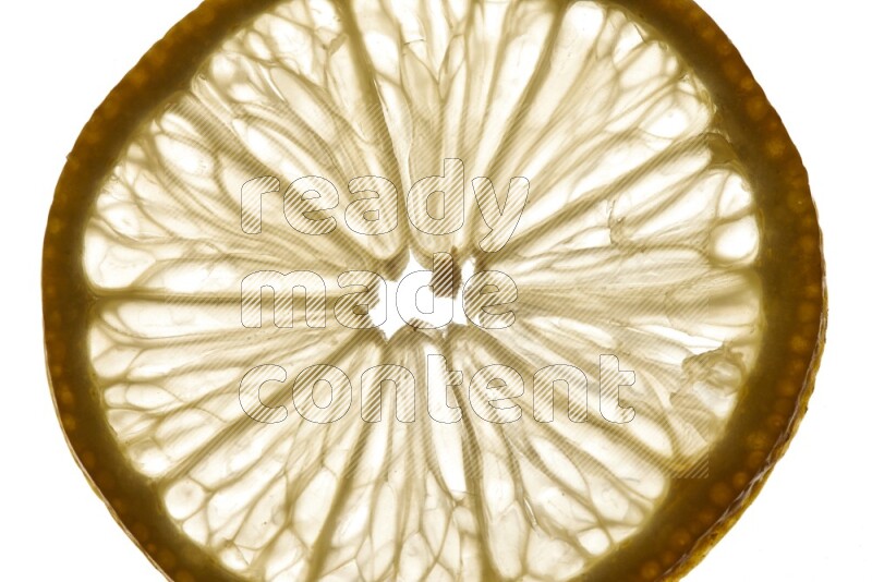 Lemon slices on illuminated white background