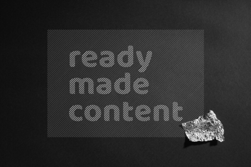 Aluminium foil on black background
