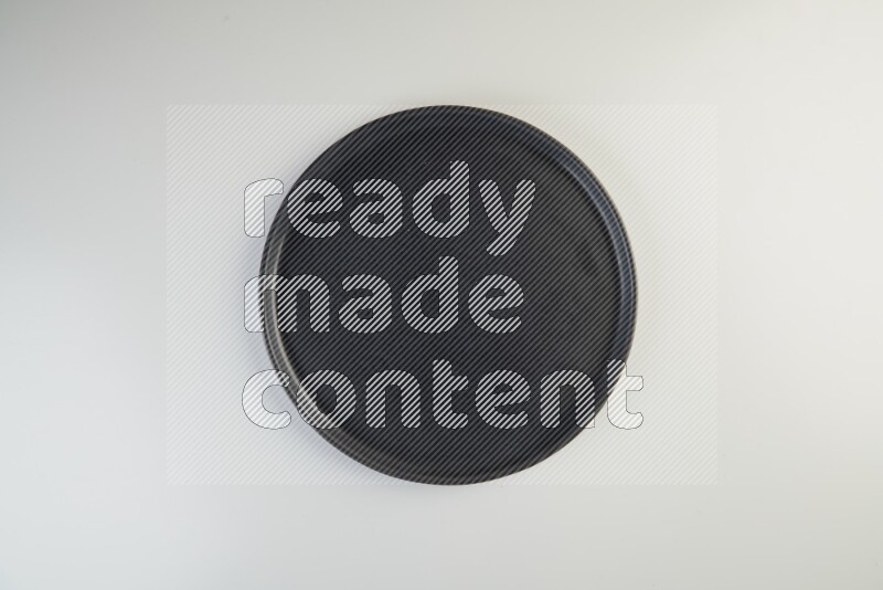 white and black plates on white background