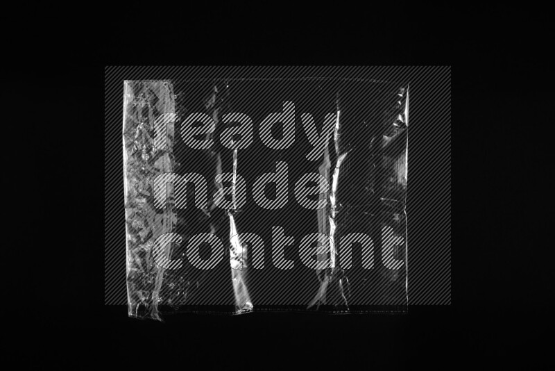 Transparent plastic textures on black background