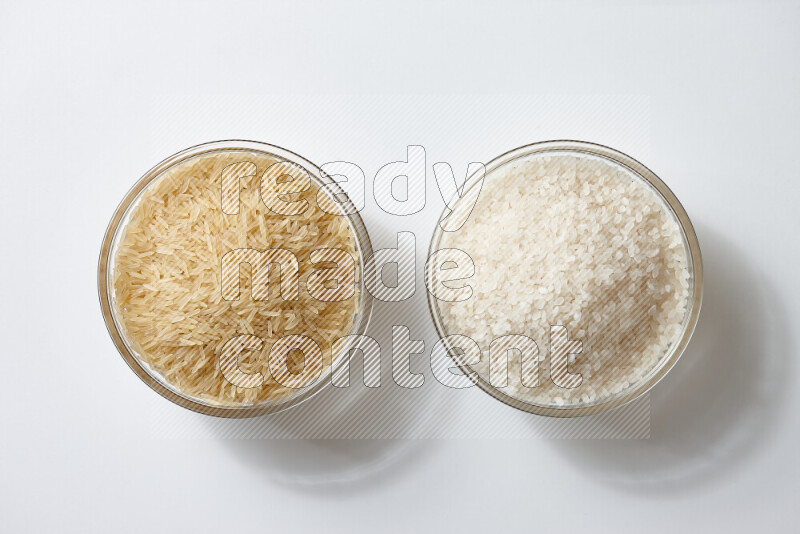 White rice with golden rice on white background