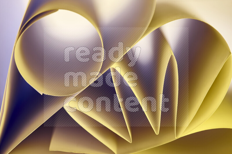 An artistic display of paper folds creating a harmonious blend of geometric shapes, highlighted by soft lighting in warm tones