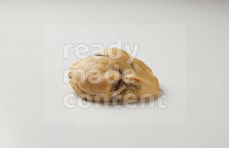 a chocolate chip cookie on a white background