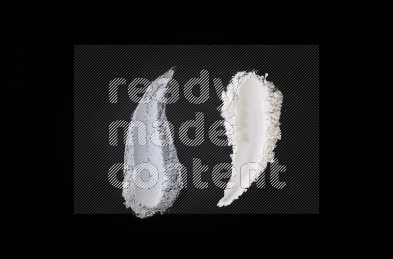 أشكال من المسحوق متعددة الألوان على خلفية سوداء