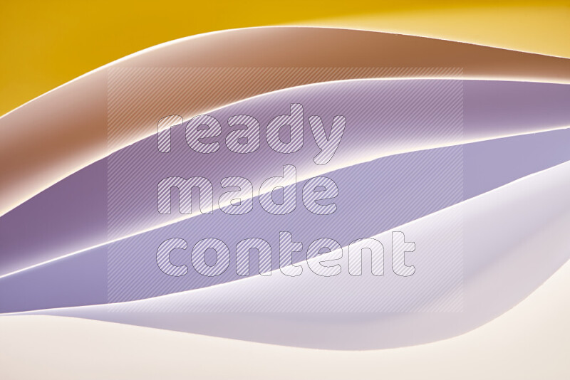 This image showcases an abstract paper art composition with paper curves in white and different warm gradients created by colored light