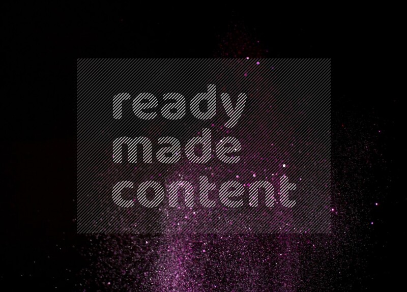 Pink glitter powder isolated on black background