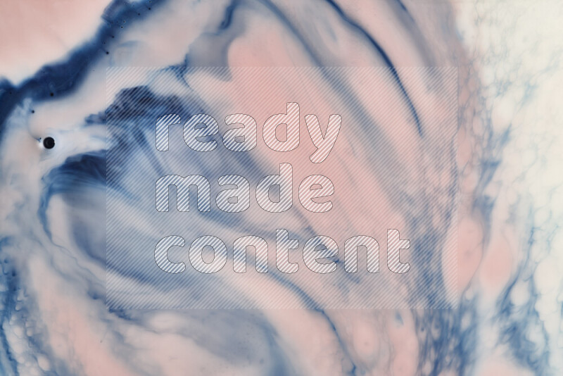 A close-up of abstract swirling patterns in blue, red and white