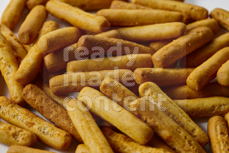 Assorted snacks on white background