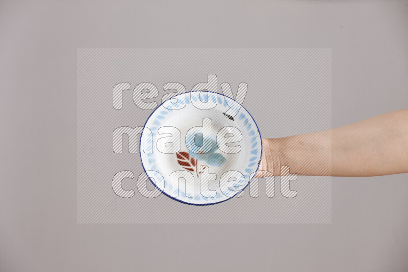 Woman hands holding different metal essentials in different positions