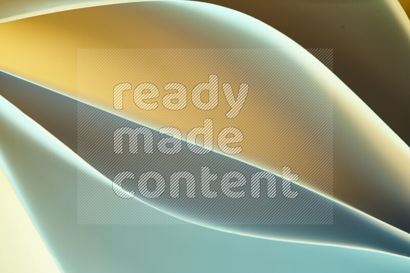 هذه الصورة تعرض تكوين فن الورق التجريدي مع منحنيات ورقية بتدرجات اللون الأخضر والأصفر المكونه بواسطة الضوء الملون