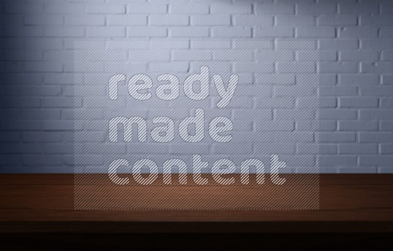 A wooden table top with colored brick wall background