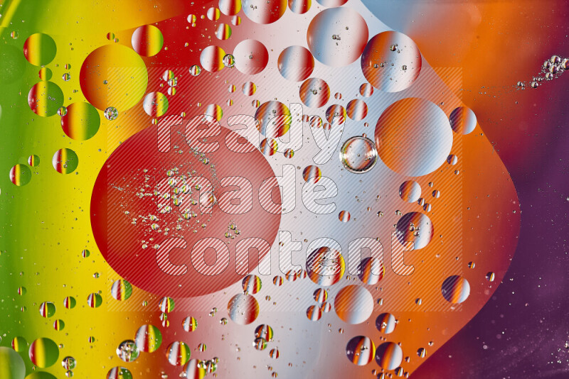 Close-ups of abstract oil bubbles on water surface in multicolors