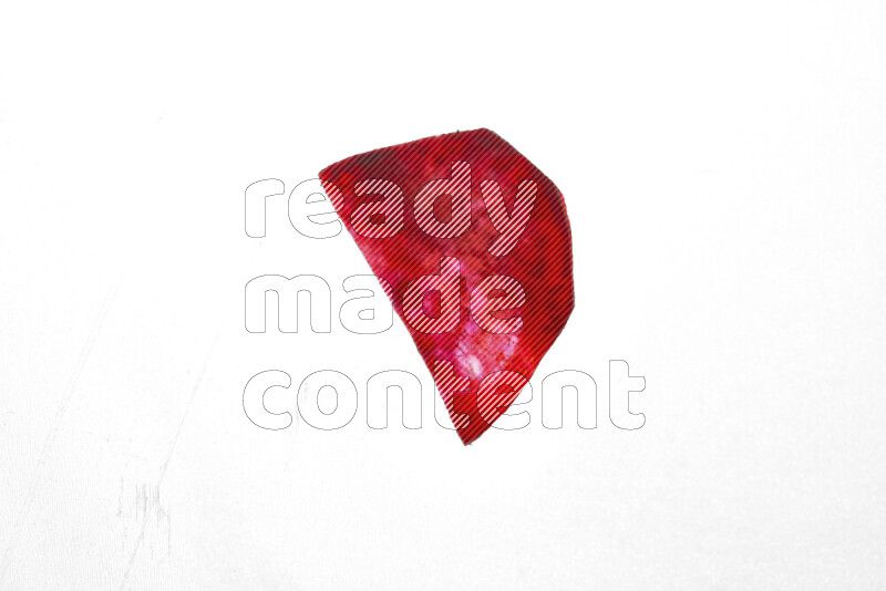 Beet slices on illuminated white background
