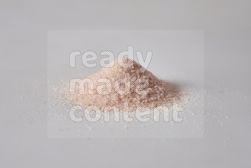 A bunch of fine himalayan salt on white background