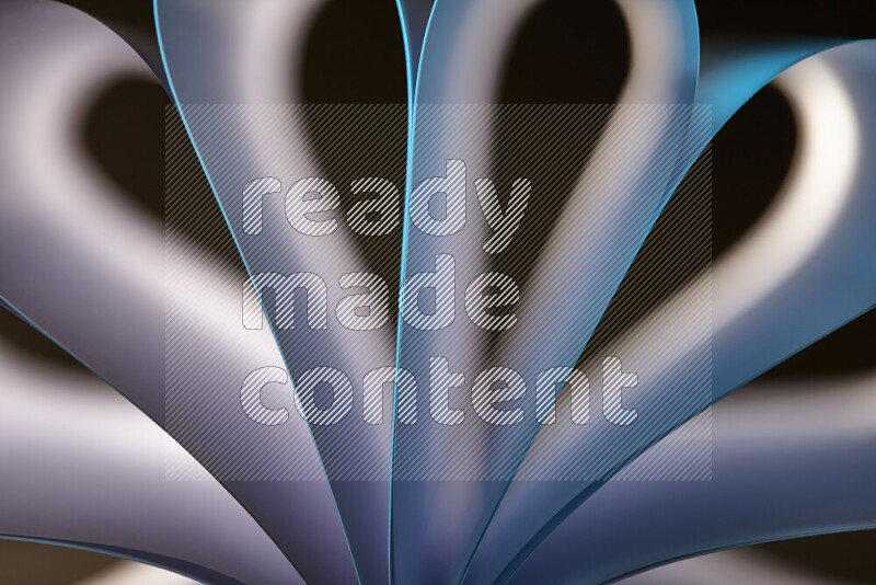 فن تجريدي يعرض منحنيات وتدرجات اللون الأبيض والأزرق مكونه بضوء ملون