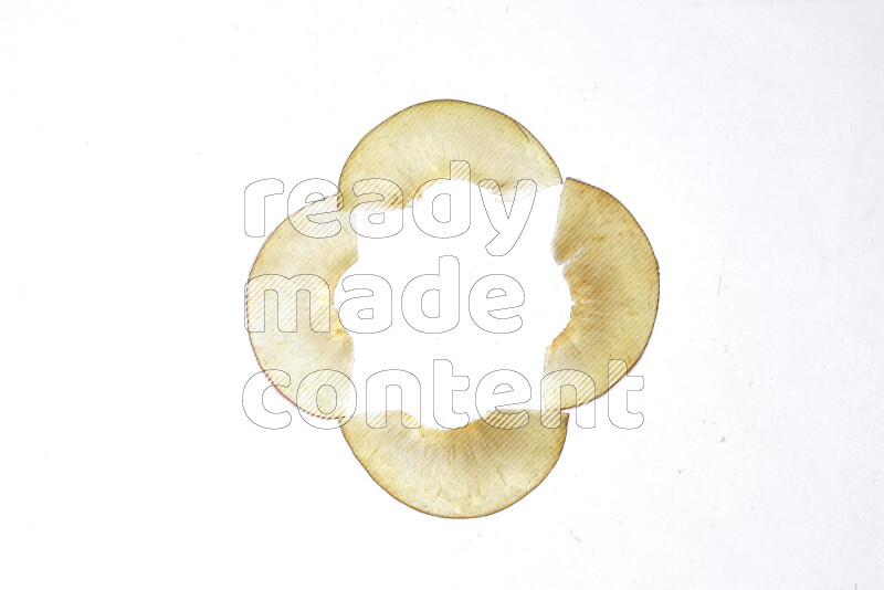 Peach slices on illuminated white background