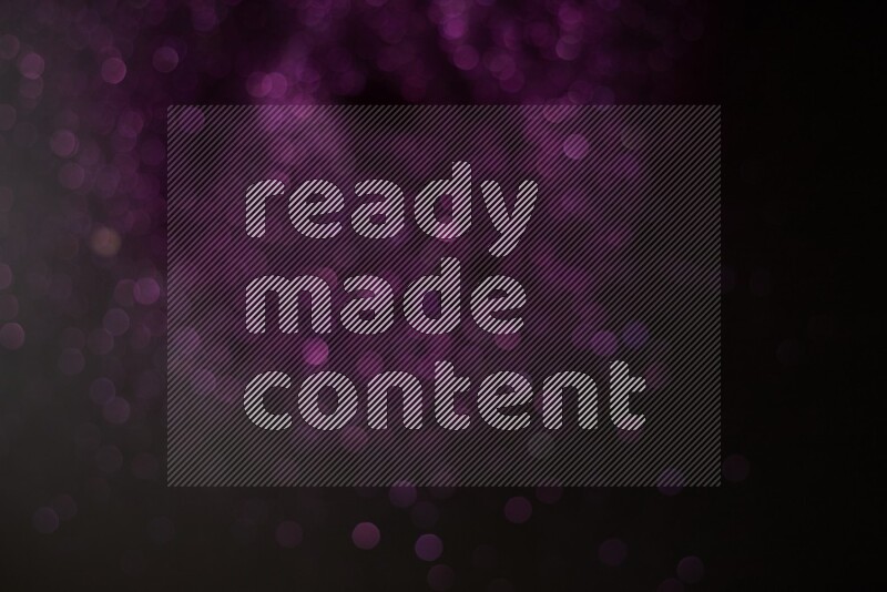 Purple glitter powder isolated on black background