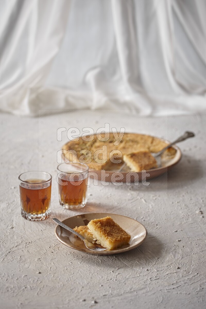 Konafa with tea in a light setup