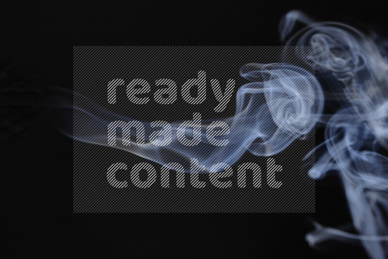 Motion of wavy smoke isolated on dark background